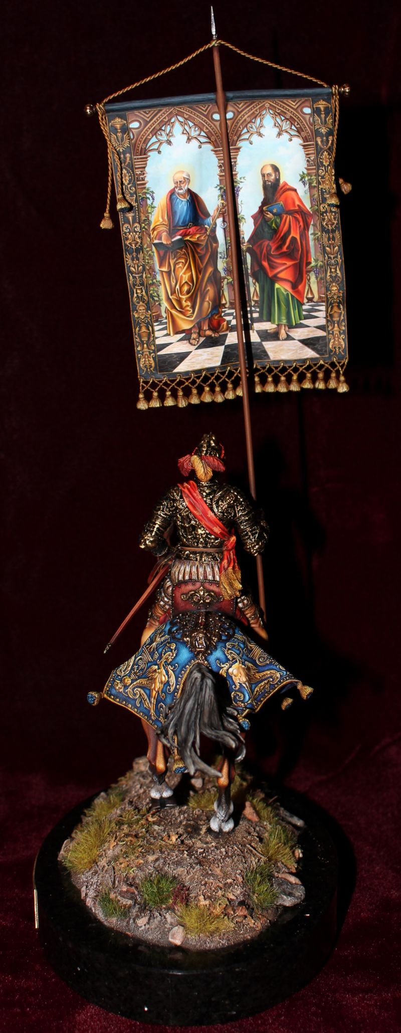 Knight in parade armor with banner