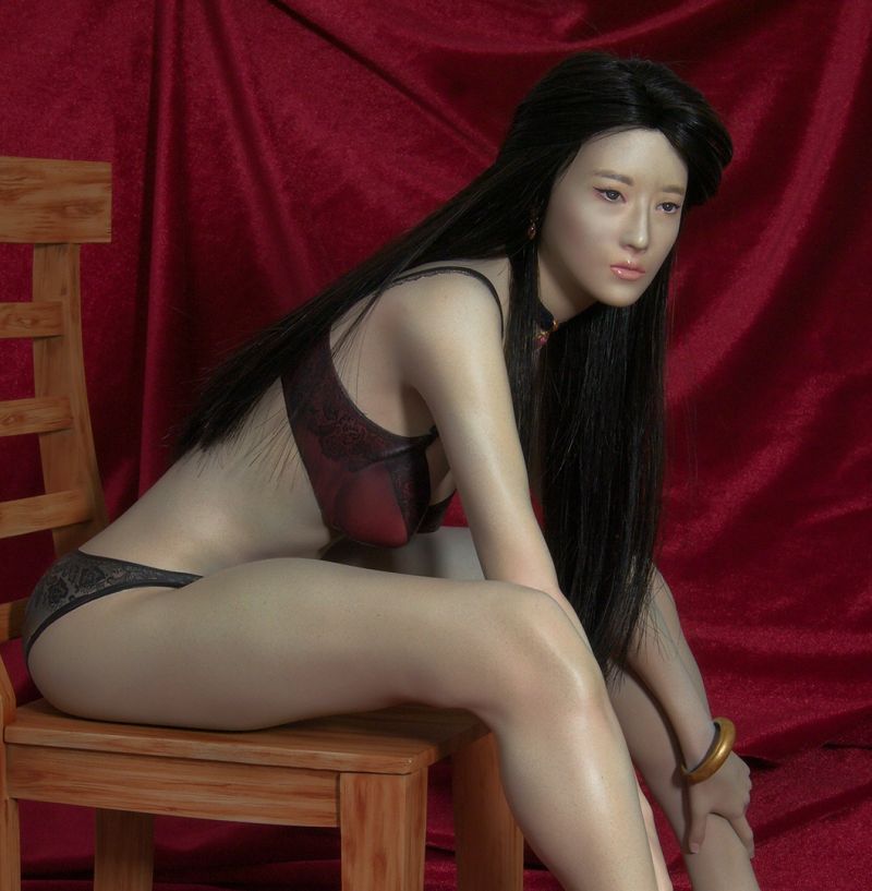 Liu Yifei on a chair
