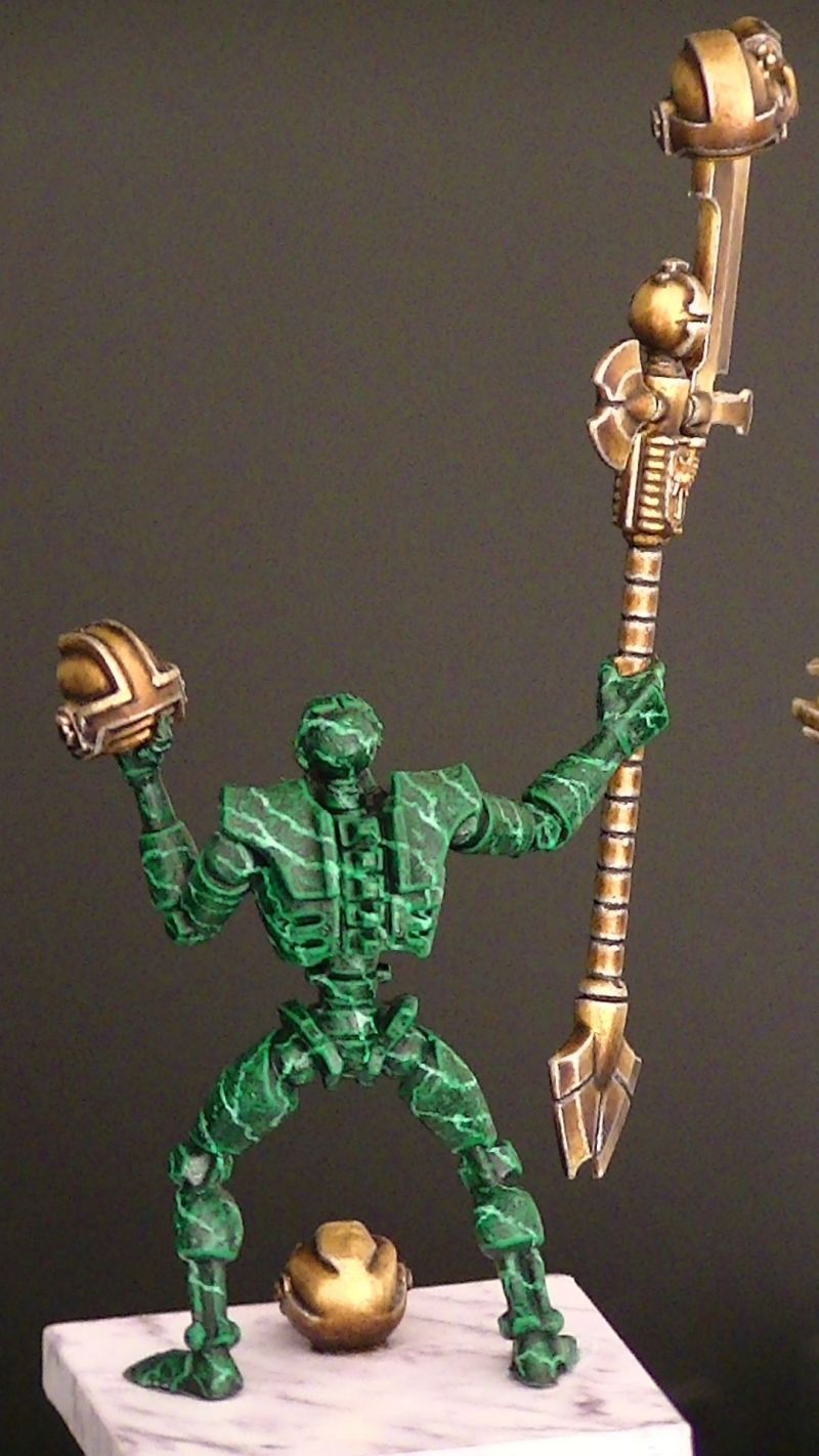 Necron statues of green marble and gold