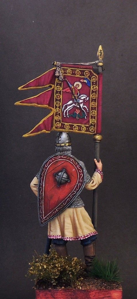 Russian soldier with the banner of St.St. George, 11th-13th centuries.